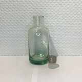 Old bottle and its cork stopper.