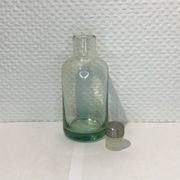Old bottle and its cork stopper.