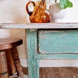 Wooden farmhouse coffee table green base