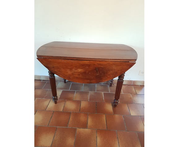 Old round table with flaps