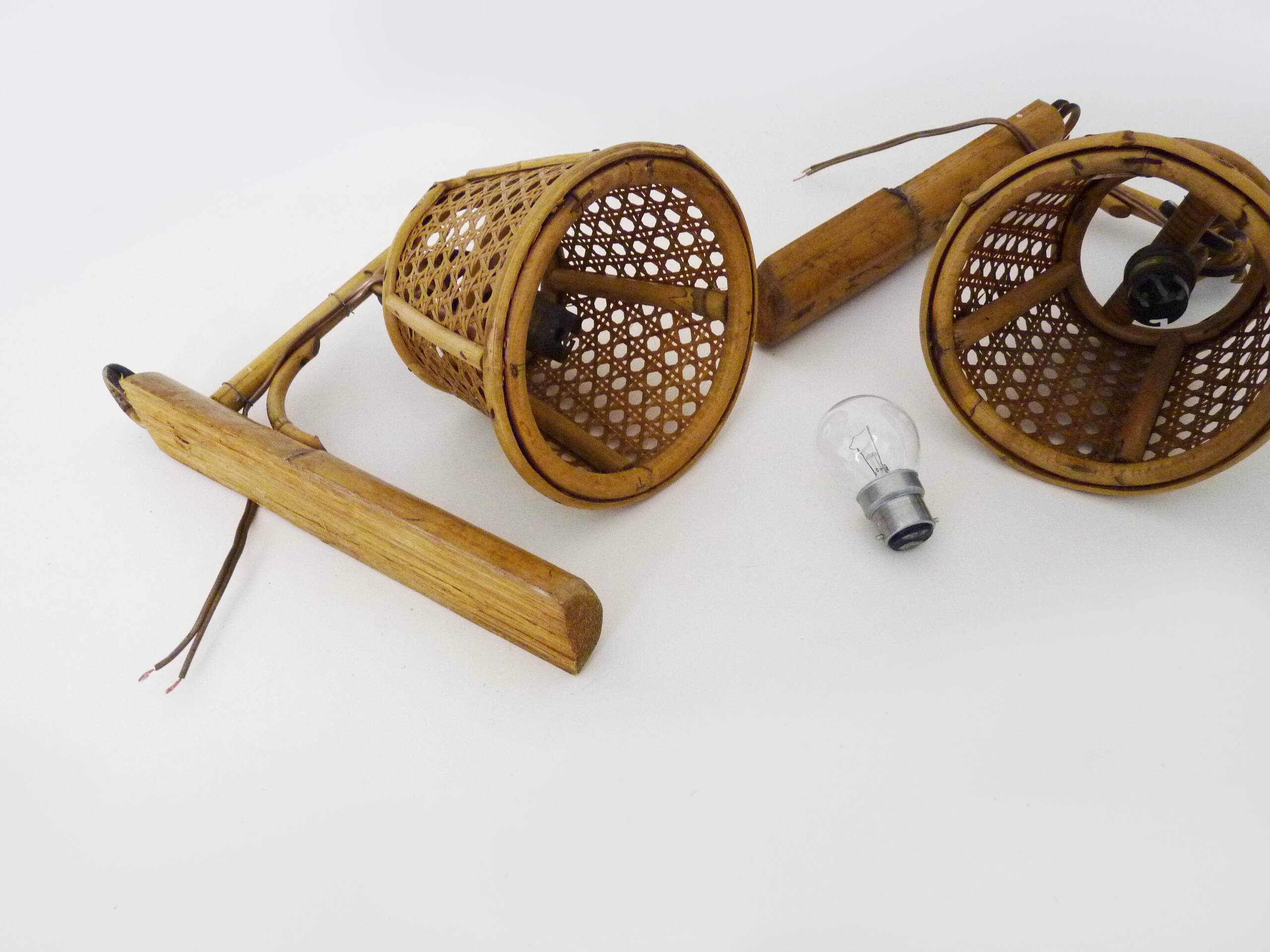 Pair of rattan and cane lantern wall lights. 1950s-60s