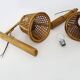 Pair of rattan and cane lantern wall lights. 1950s-60s