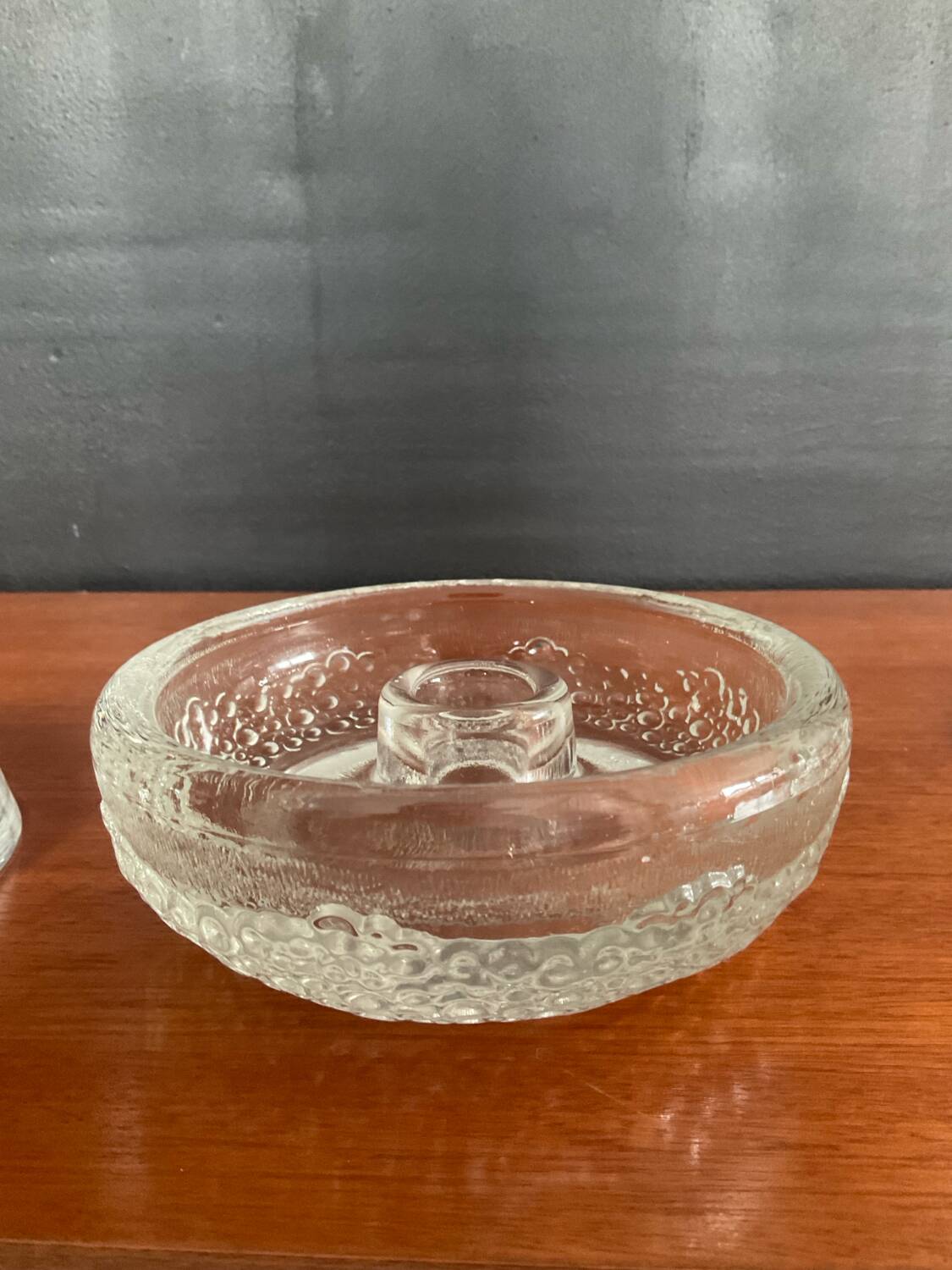 Set of three round thick moulded glass candle holders