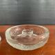 Set of three round thick moulded glass candle holders