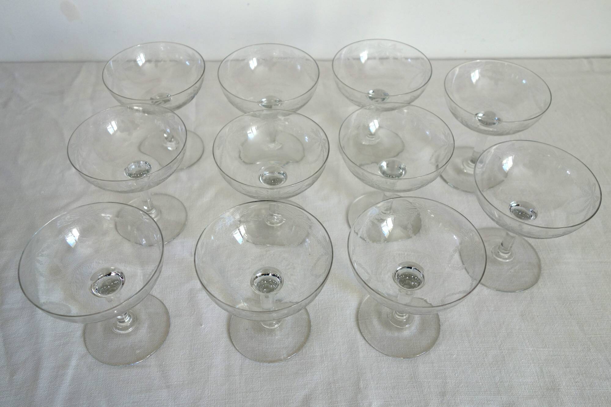 11 vintage engraved crystal champagne coupes