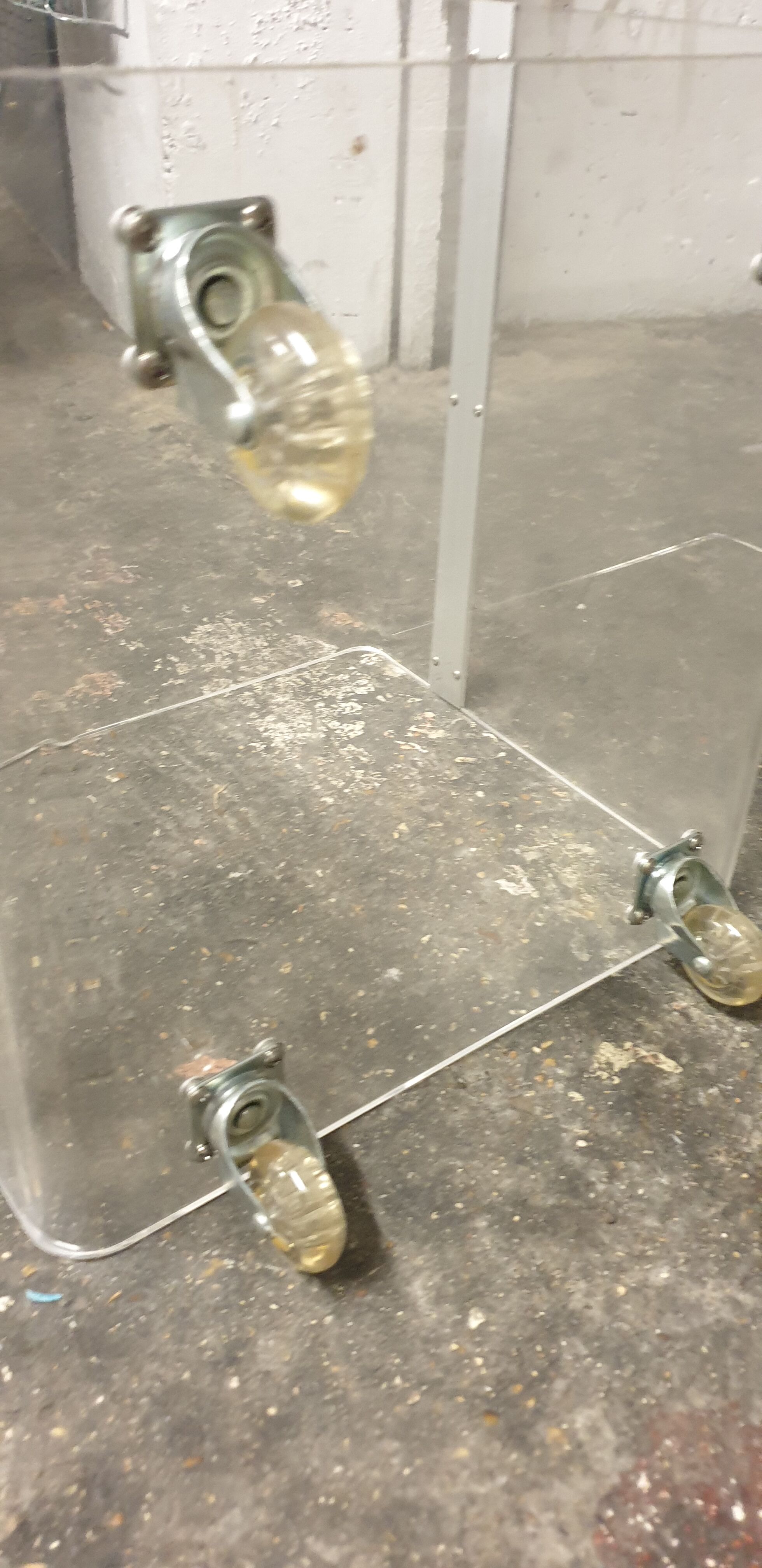 Vintage plexi coffee table with David Lange casters