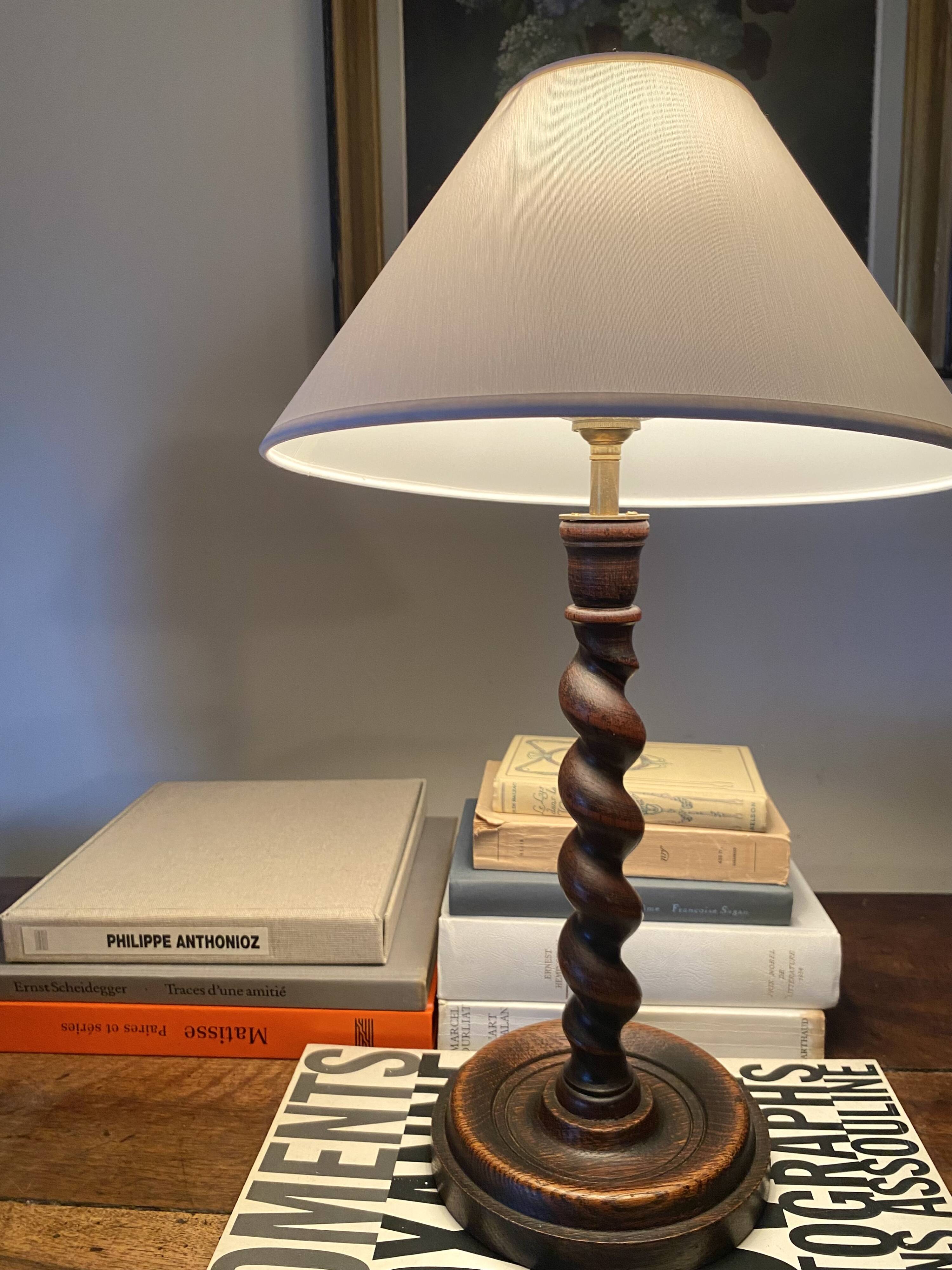 Turned wooden lamp base, fabric cable