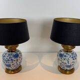 Pair of porcelain lamps with Chinese-style decorations and brass.