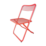 Vintage red metal folding chair