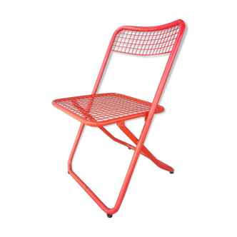 Vintage red metal folding chair