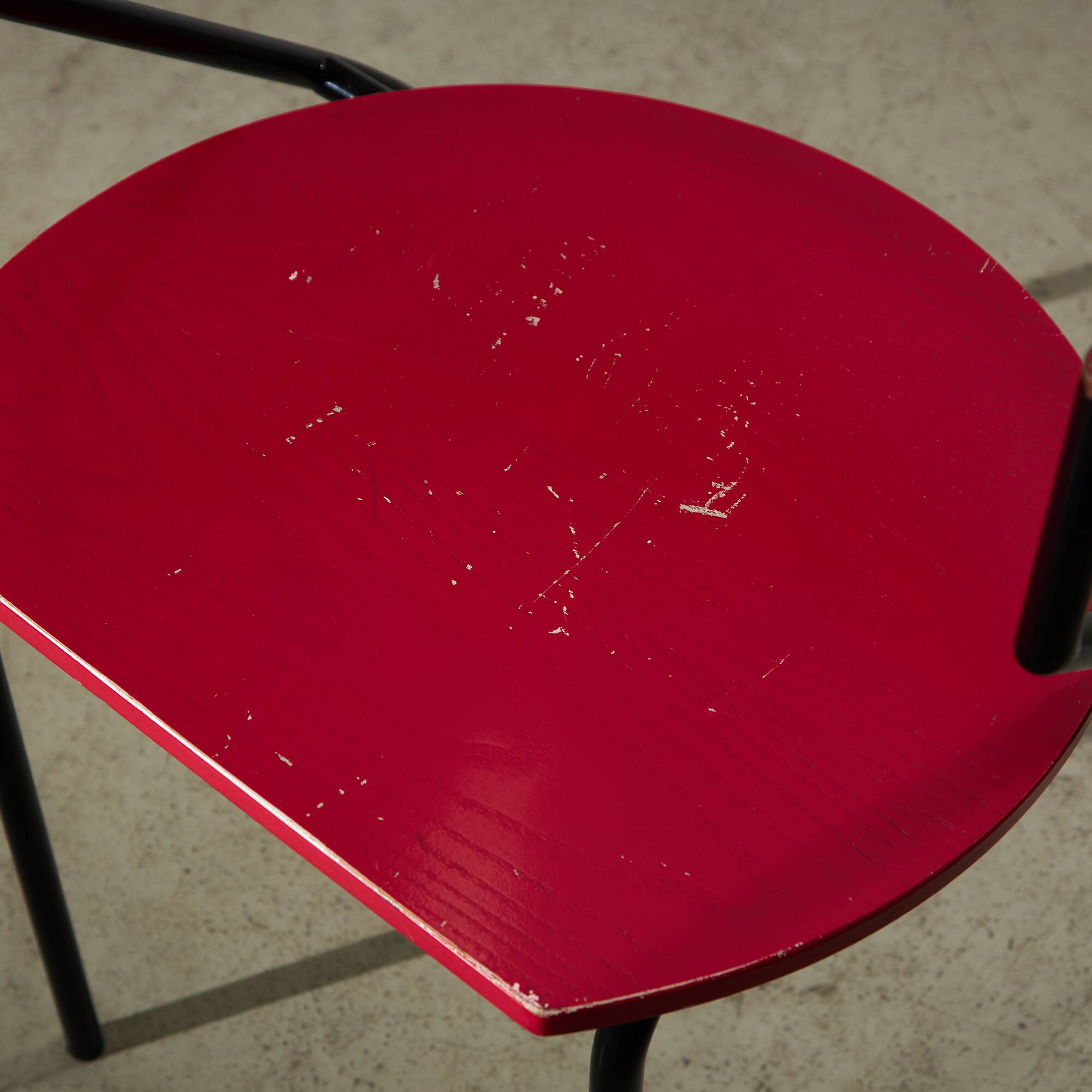 Red Plywood and Curved Metal Frame Chair