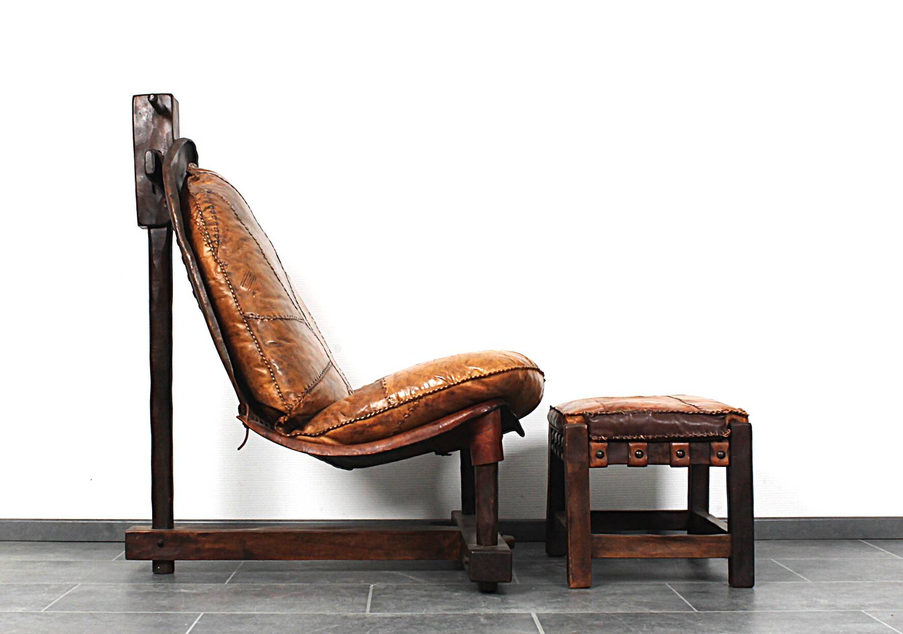 Brutalist oak lounge chair and ottoman, 1970s, set of 2