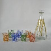 Colorful designer set composed of 7 liqueur glasses and a seventies 70s carafe