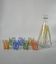 Colorful designer set composed of 7 liqueur glasses and a seventies 70s carafe