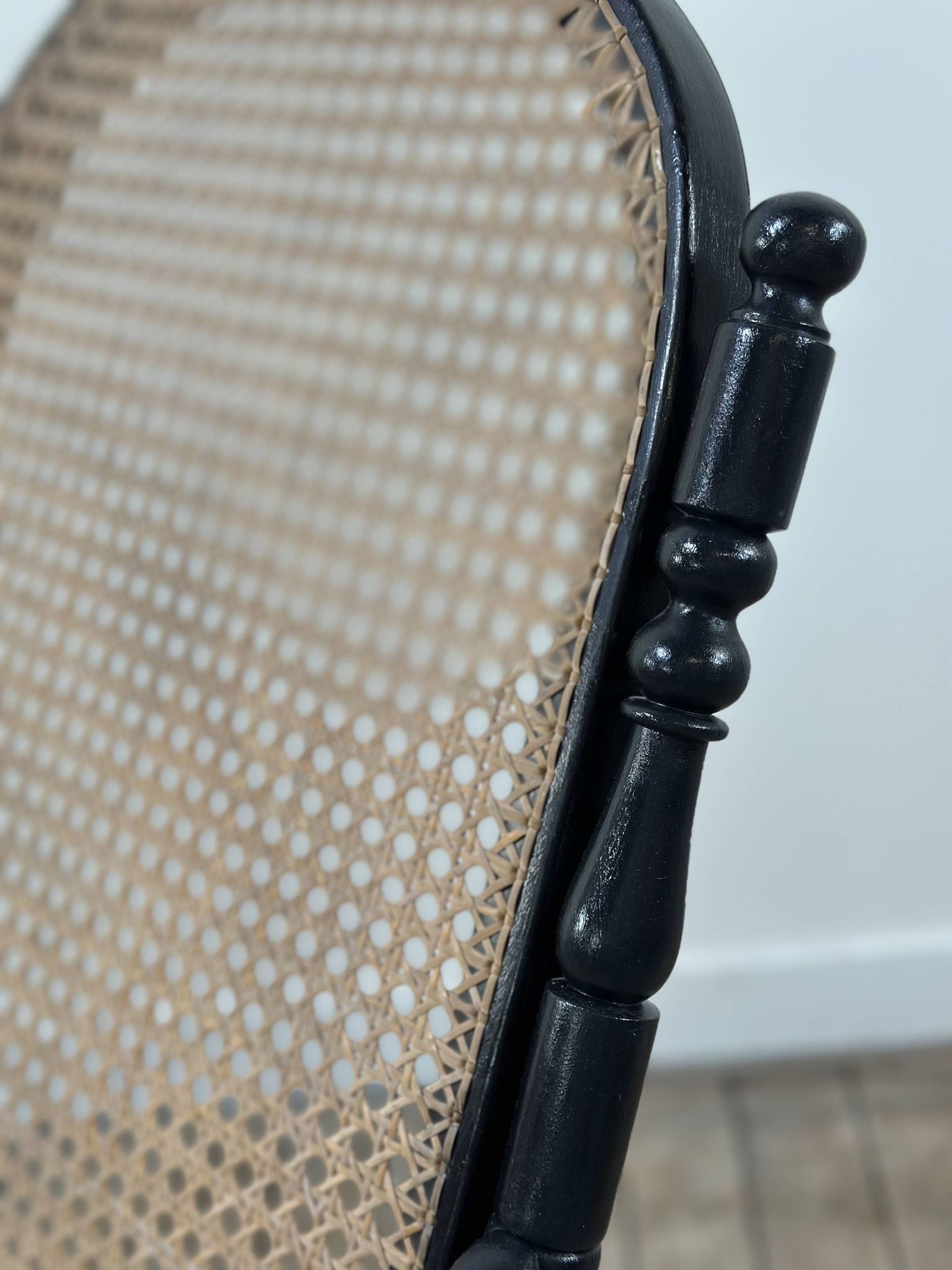 Rocking chair in blackened curved wood and cane, 1900s
