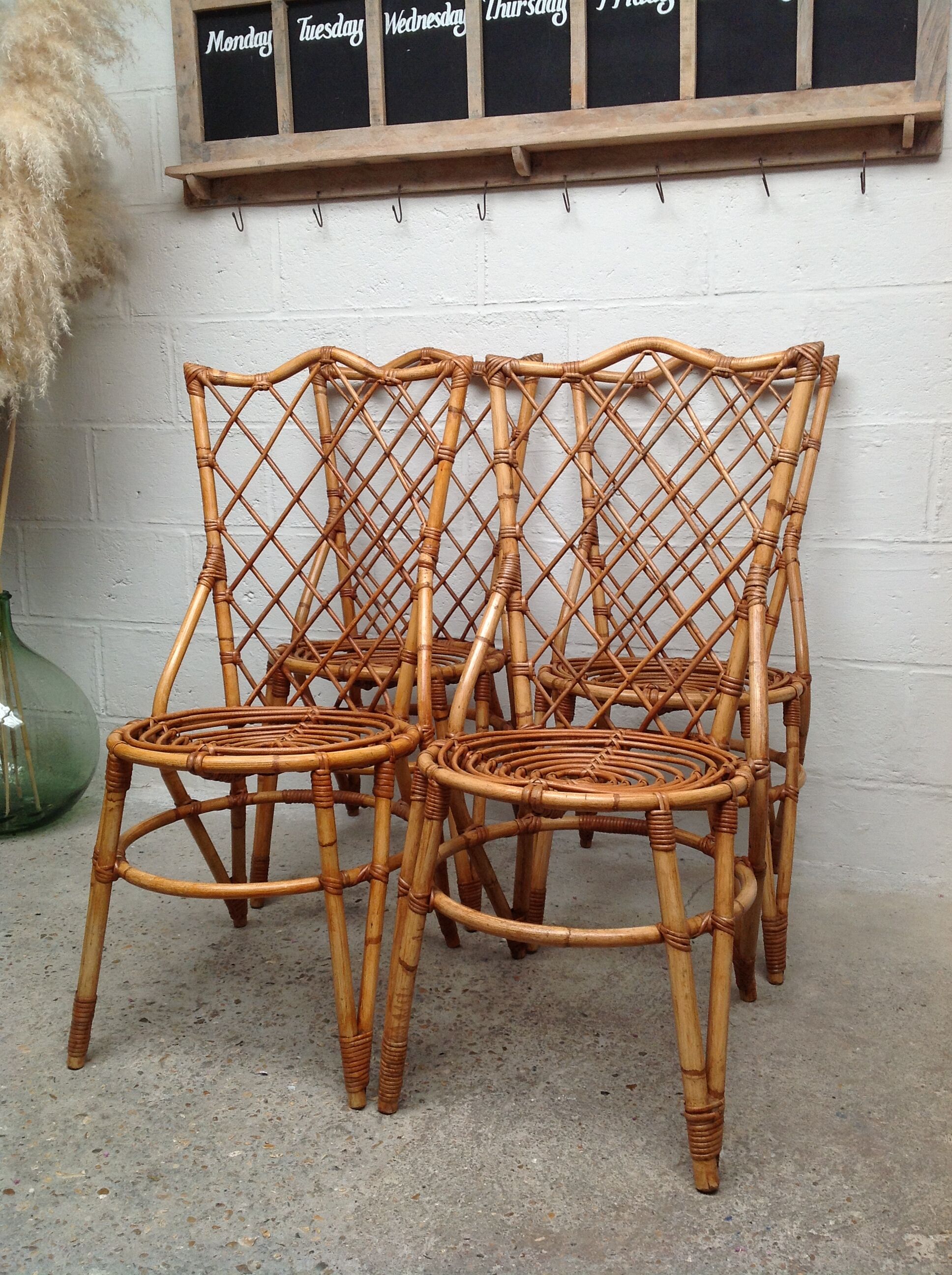 Rattan chairs by Louis Sognot