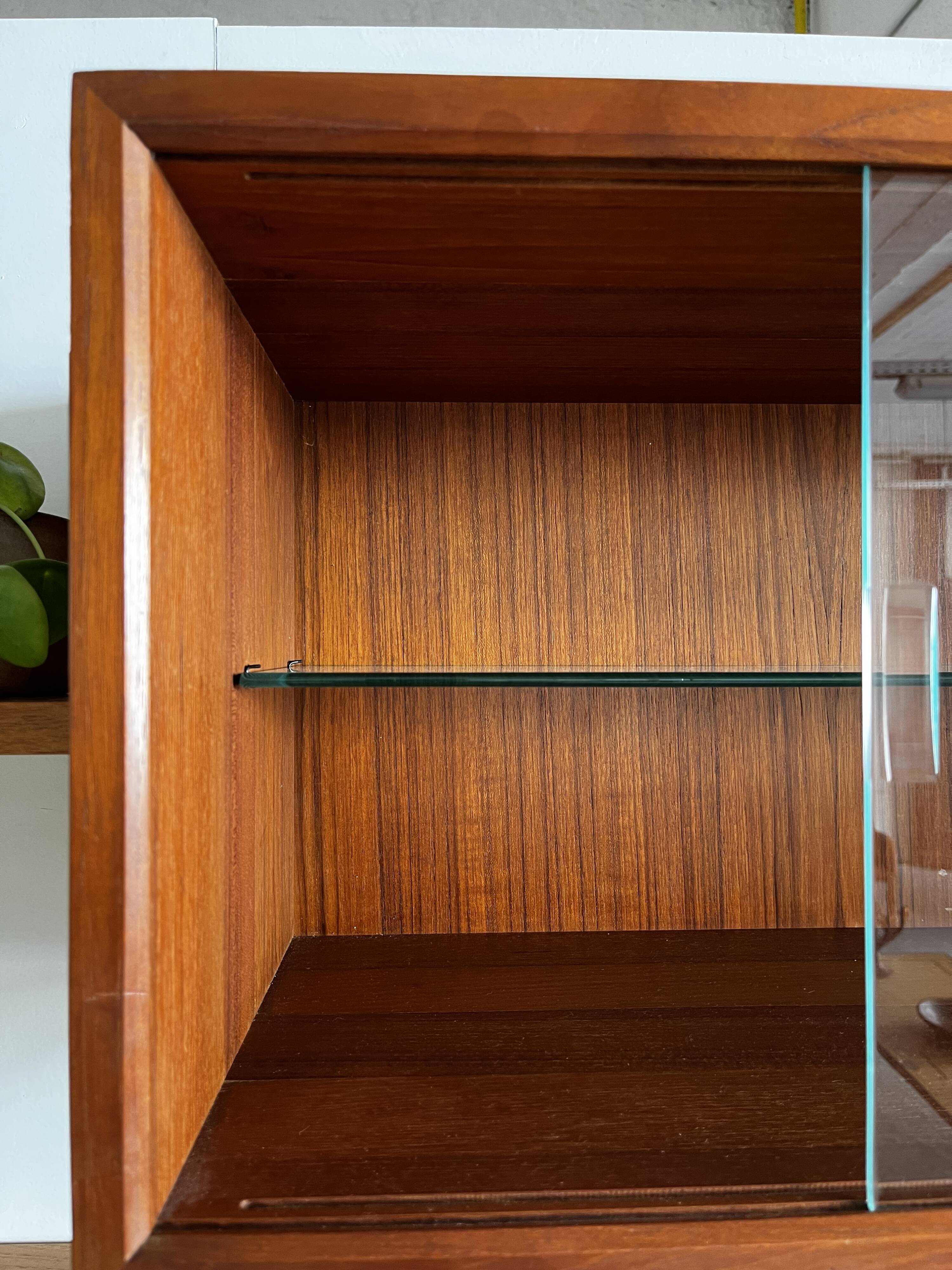A wall unit with 4 compartments by Poul Cadovius, Denmark, 1960s.