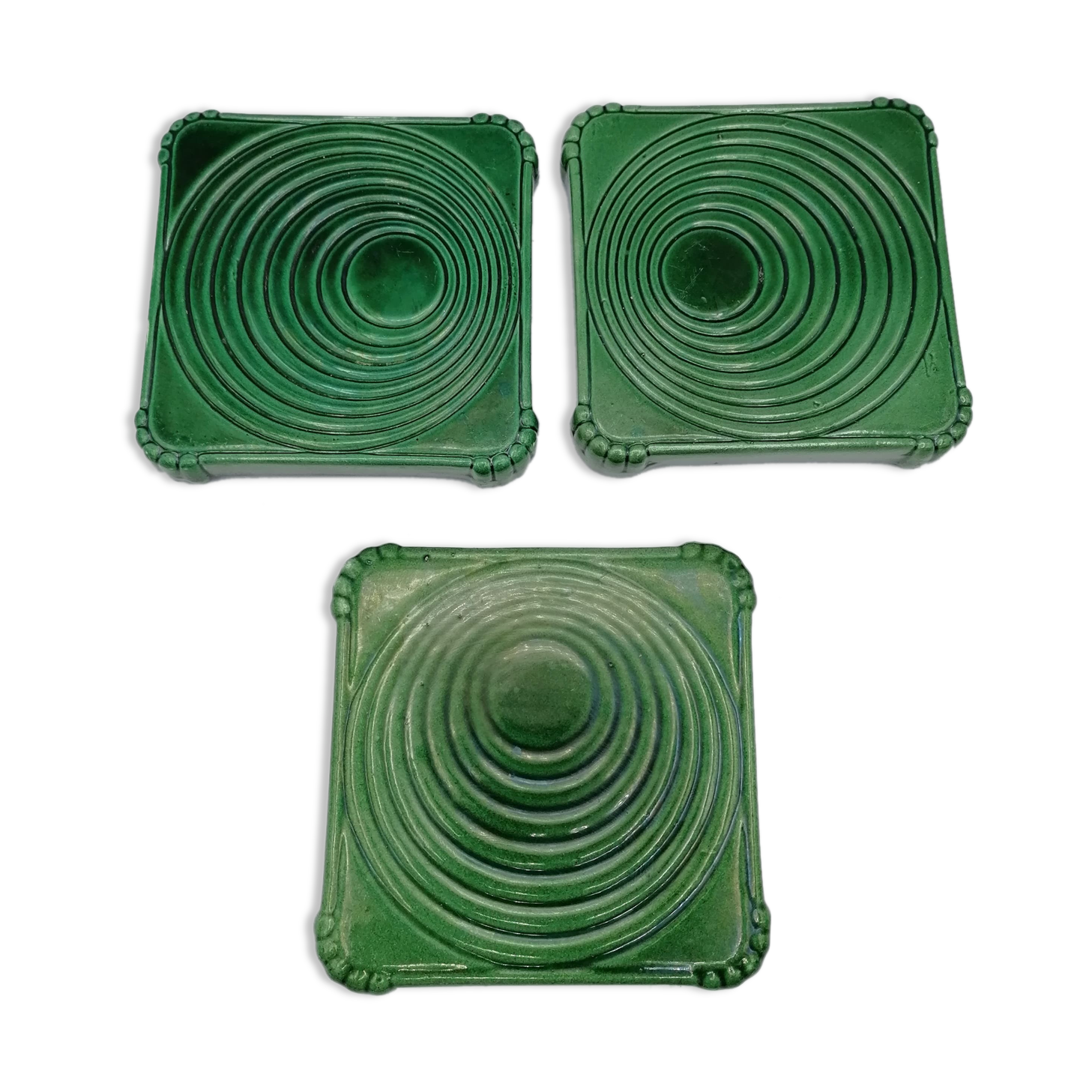 Under the plate and 3 under the bottle