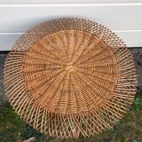 Rattan coffee table with black metal base