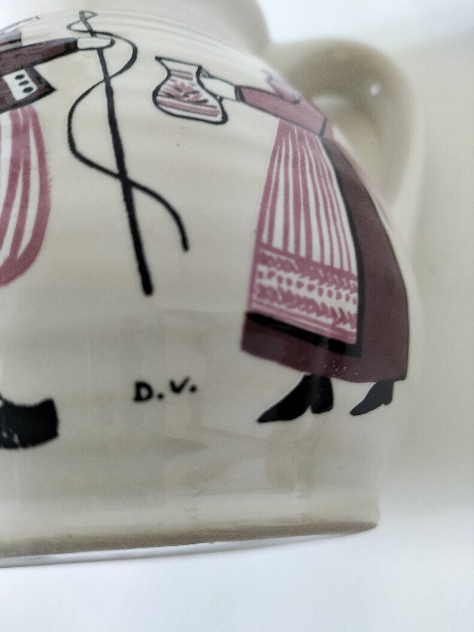 Ceramic pitcher from Quimper, created by Dominique Villard.