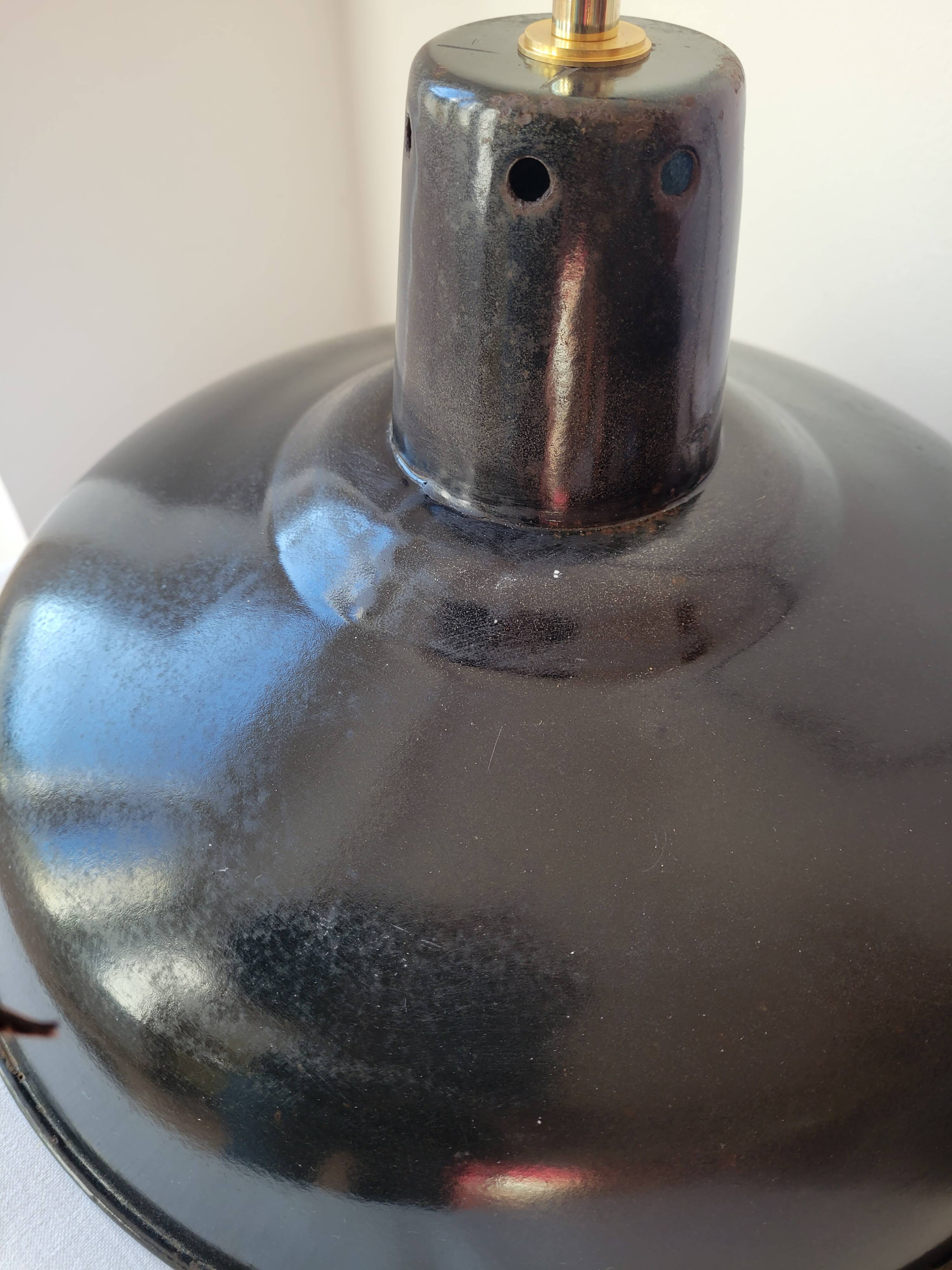 Duo of white and black enameled sheet metal pendants