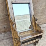Antique barber's mirror in Burmese teak.