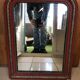 Antique Louis Philippe mirror in wood and plaster with a row of pearls and vintage friezes