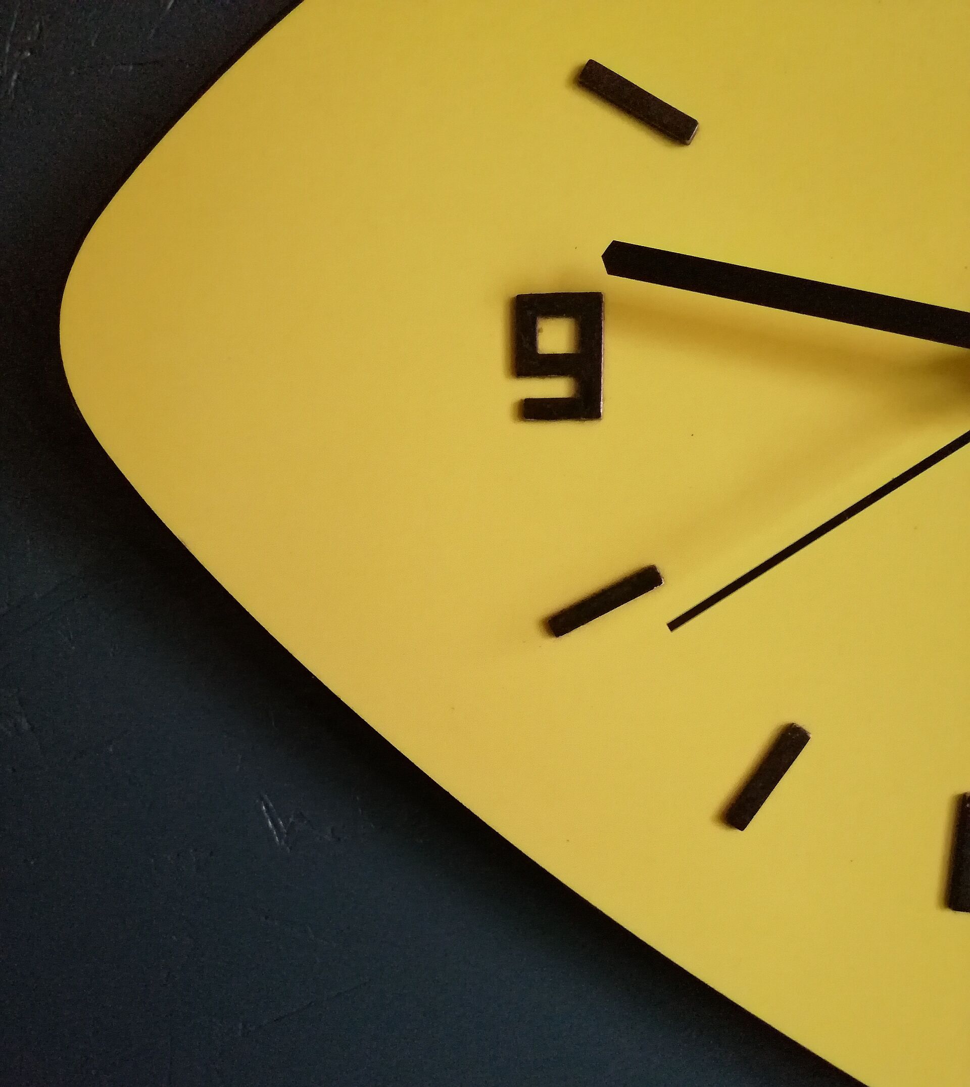 Formica vintage asymmetrical silent wall clock "Yellow Star"