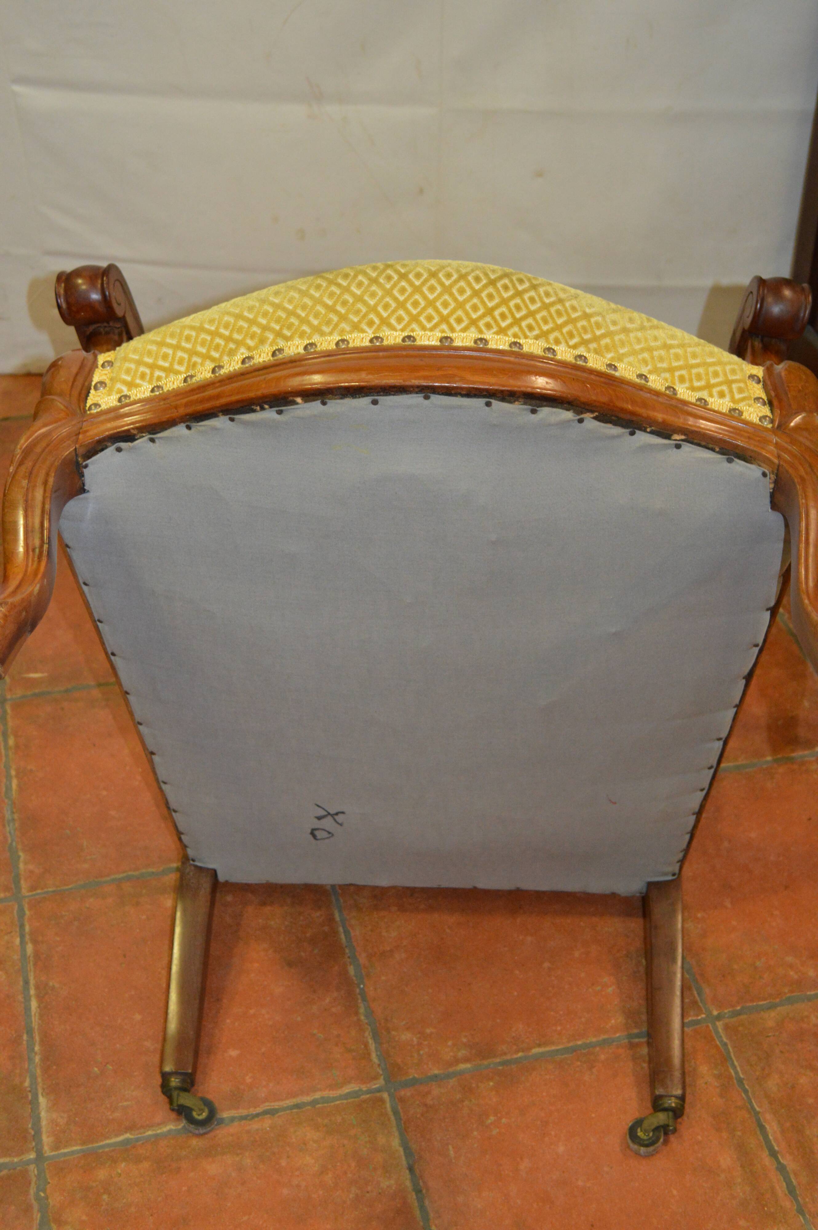 Walnut voltaire armchair