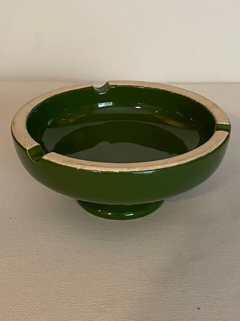 Vintage green ashtray on foot