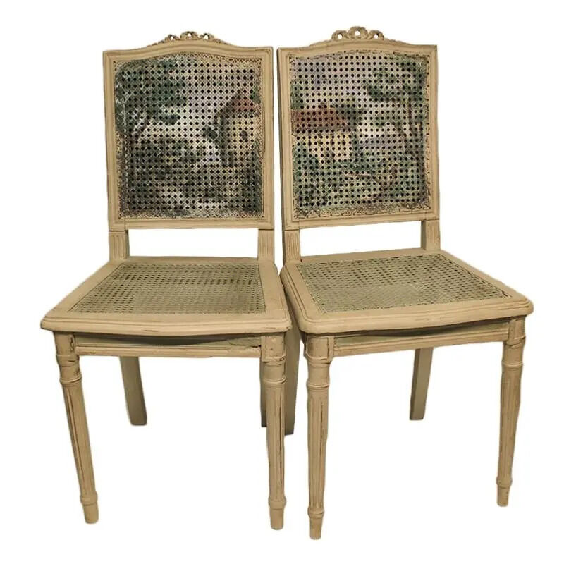 Pair of caned chairs