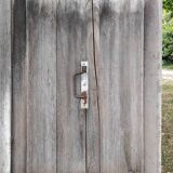 Old door with vintage wooden shutters