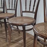 Set of 4 chairs signed Thonet with caning