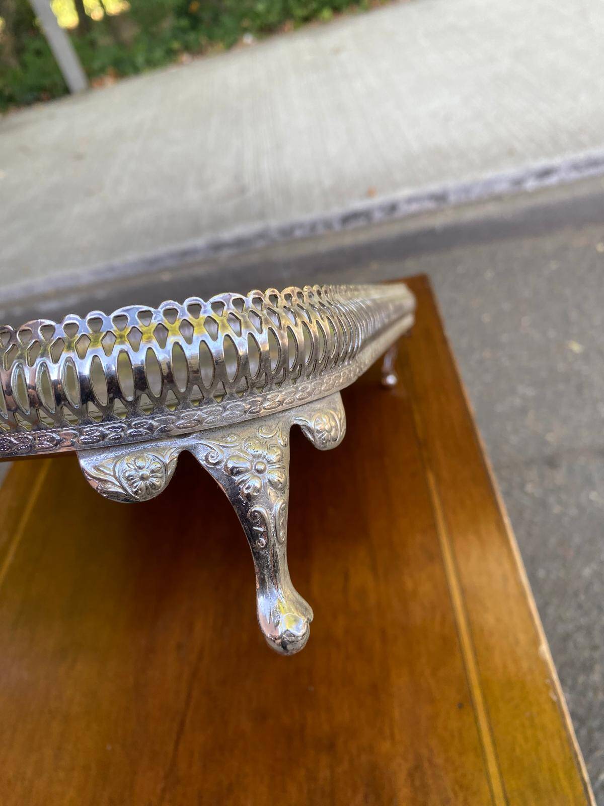Sculpted silver serving tray