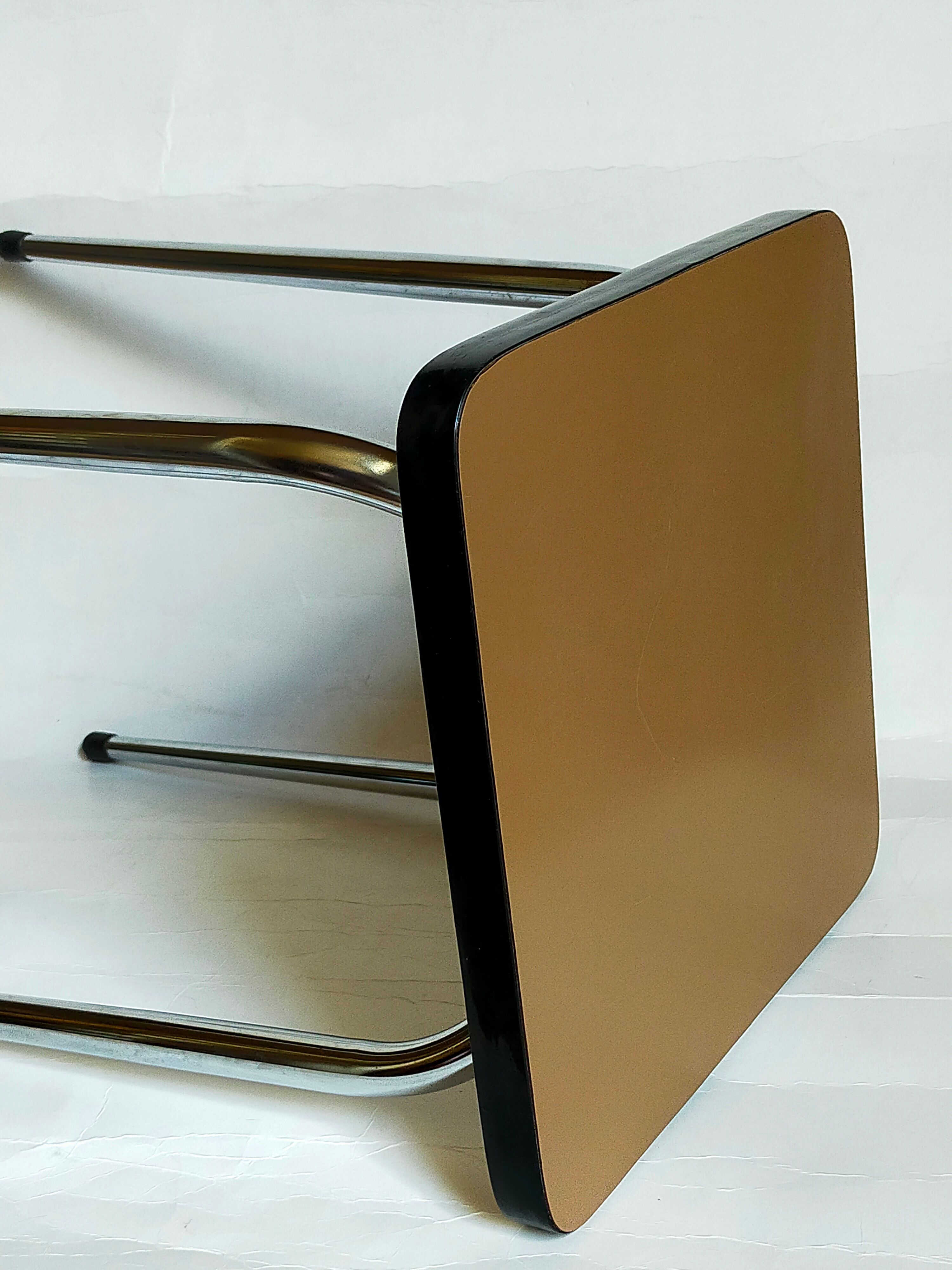 Vintage formica stool with tapered feet
