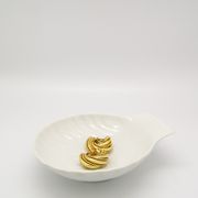 Shell-shaped pocket emptier