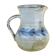 Pichet Albert Thiry with stylised blue leaves.