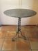 Round and antique metal side table