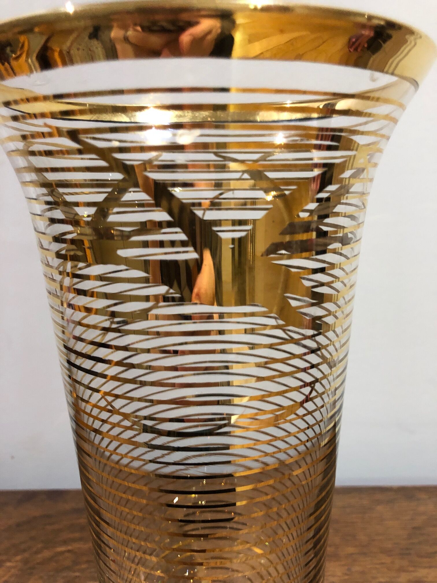 Glass vase with gold bird decoration