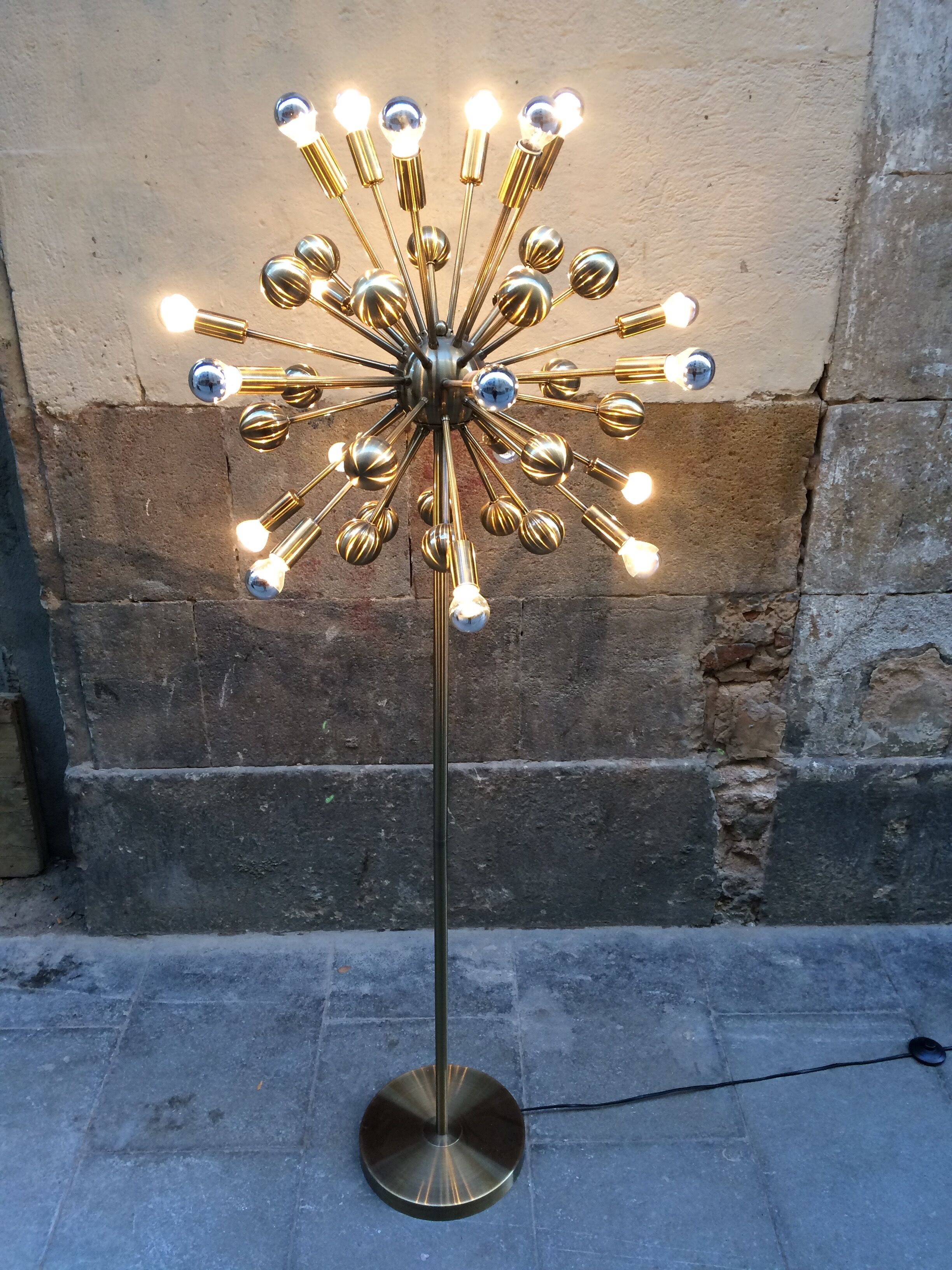 Floor lamp in gold metal of the 1960s