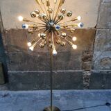 Floor lamp in gold metal of the 1960s