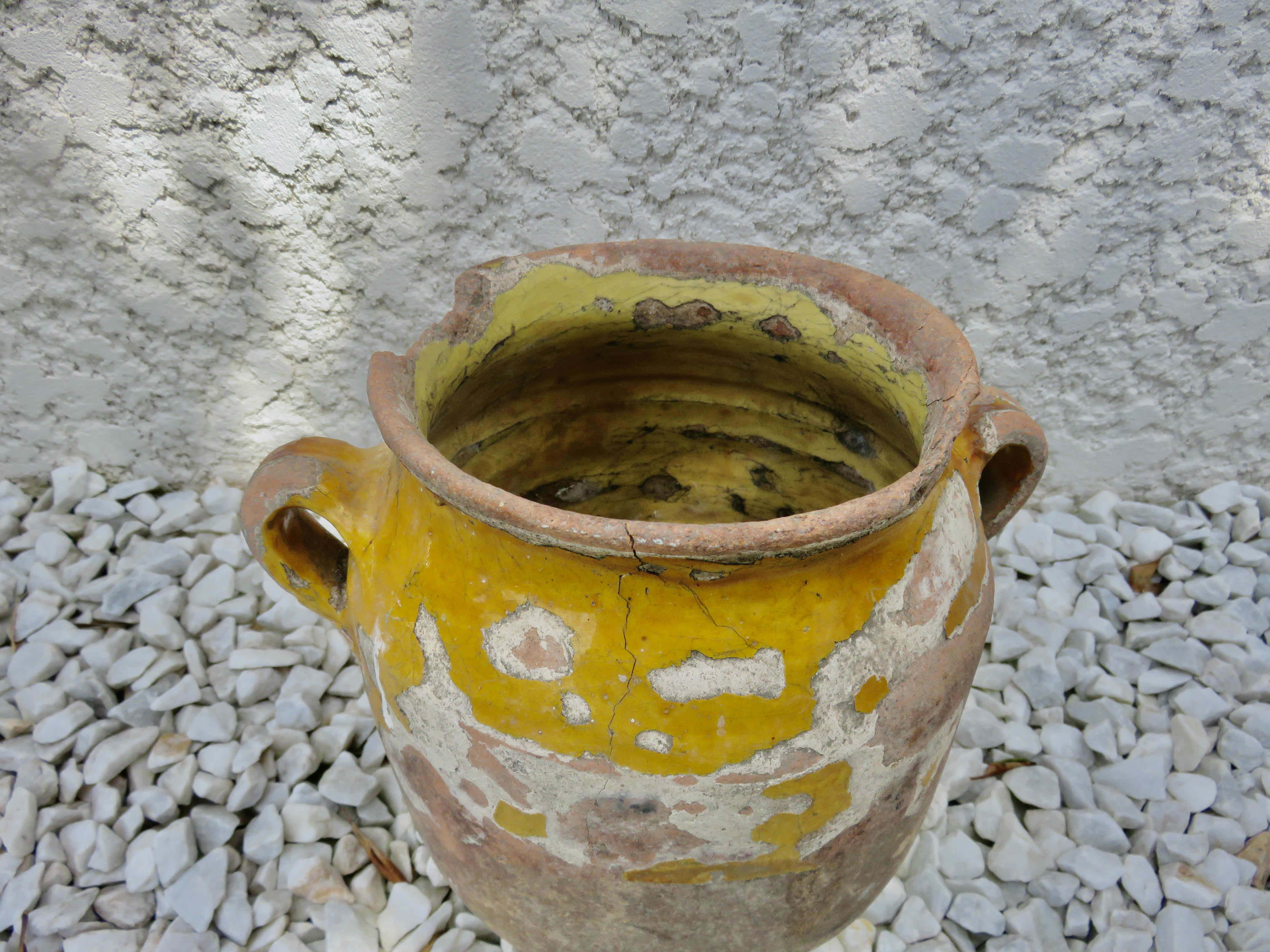 Old candied pot in yellow glazed terracotta XIX century