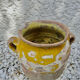 Old candied pot in yellow glazed terracotta XIX century