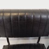 Set of 2 vintage modernist armchairs in black faux leather and metal.