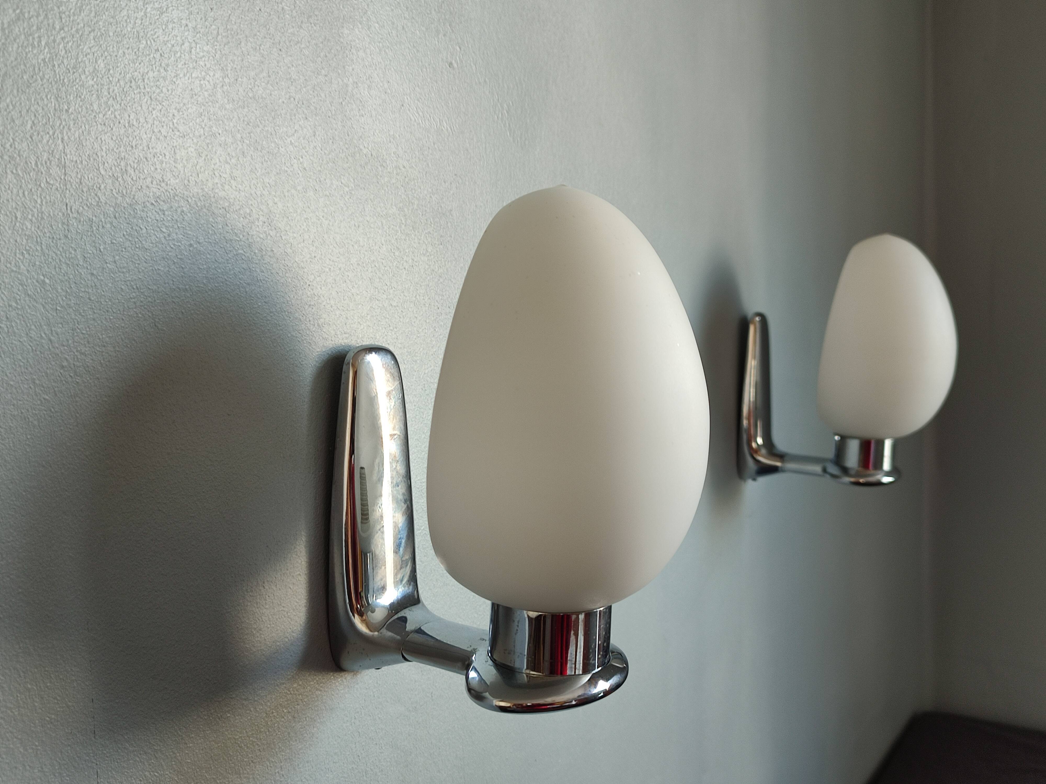 Pair of ouefs sconces in opaline and vintage chromed metal