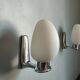 Pair of ouefs sconces in opaline and vintage chromed metal