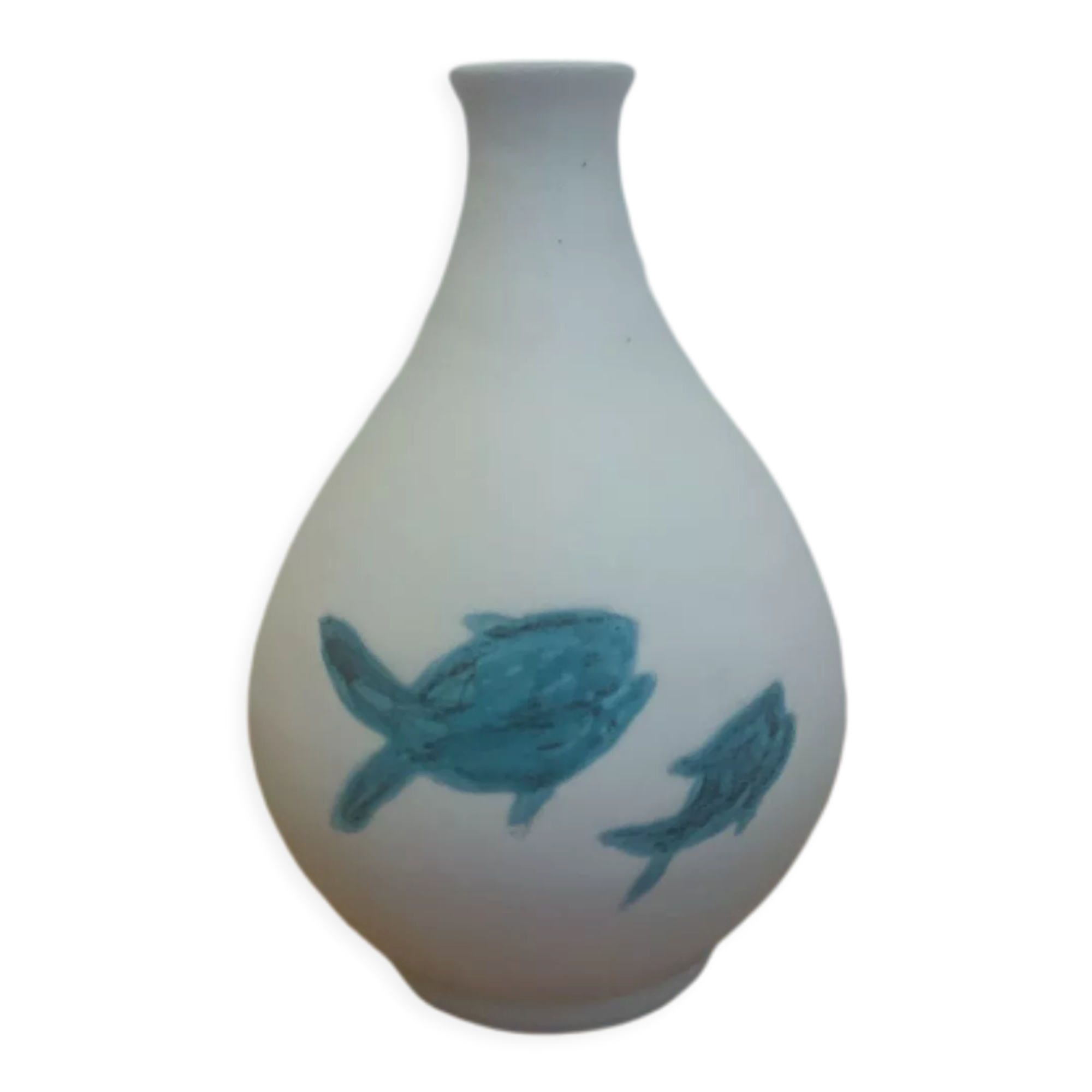 White ceramic with dolphin motif