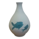 White ceramic with dolphin motif