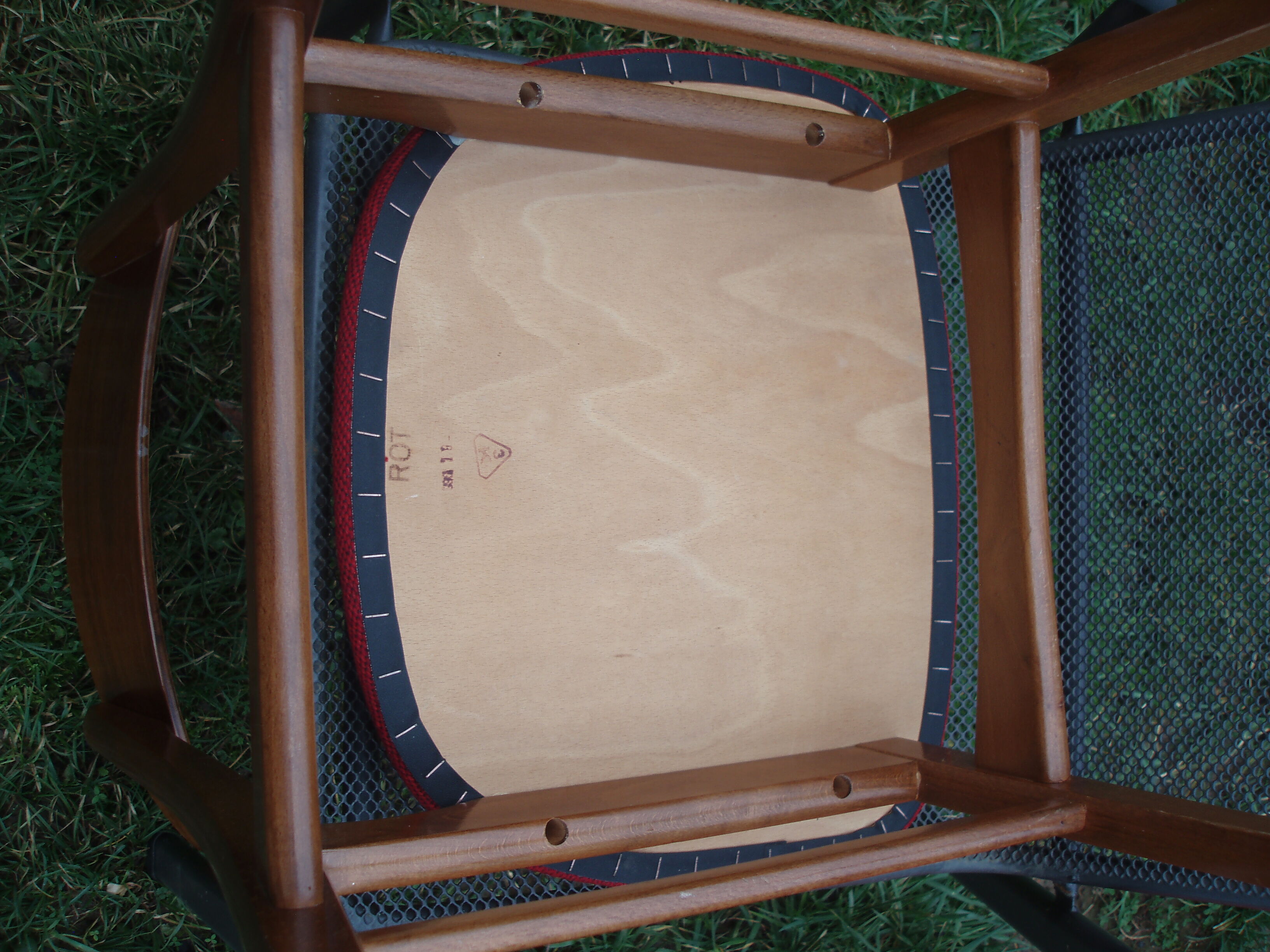 Pair of Scandinavian chairs in teak and red fabric