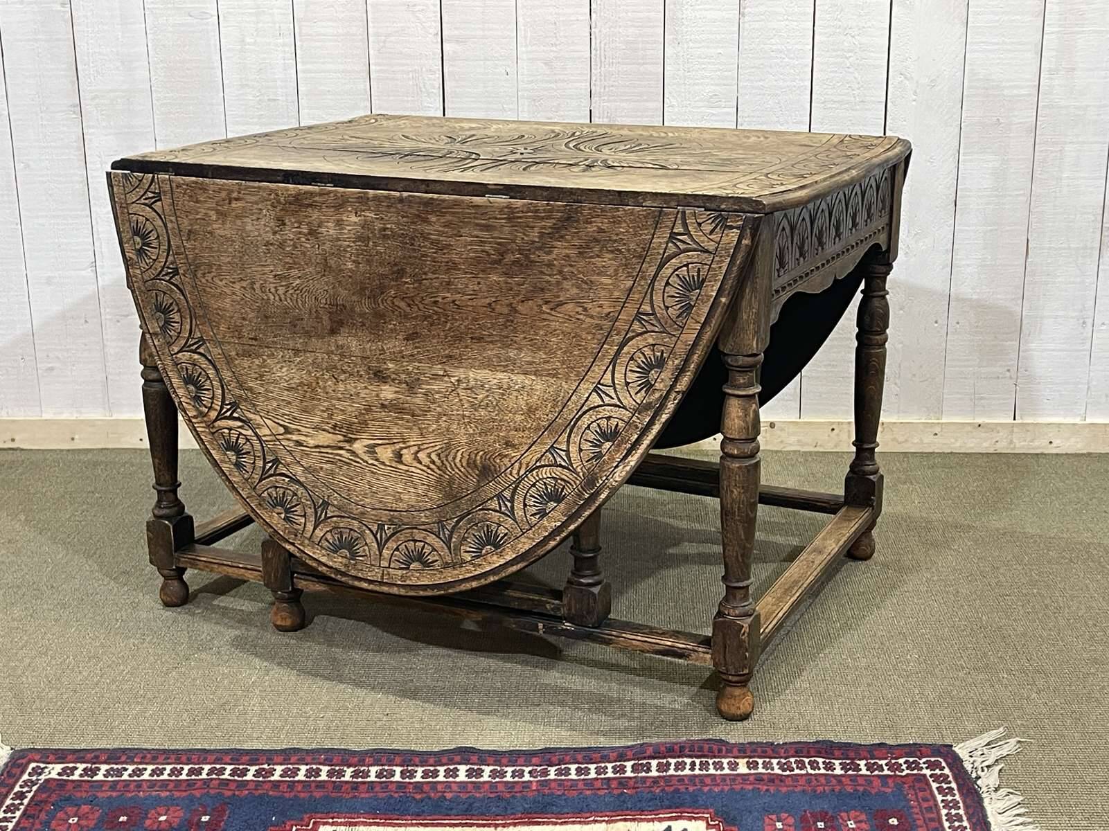 English oak drop-leaf table from the early 20th century